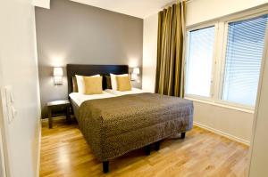 Кровать или кровати в номере Holiday Club Åre Apartments +75 фотографий