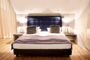 Katil atau katil-katil dalam bilik di Boardinghouse by M&K