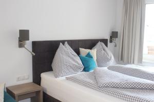 Łóżko lub łóżka w pokoju w obiekcie Apartment Elisa