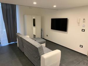 TV o dispositivi per l'intrattenimento presso Little Dreams Apartment