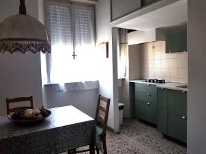 Η κουζίνα ή μικρή κουζίνα στο La Coccinella Guest House Self Check-in