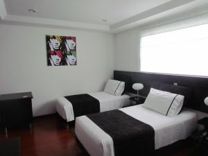 Ένα ή περισσότερα κρεβάτια σε δωμάτιο στο Hotel Classic