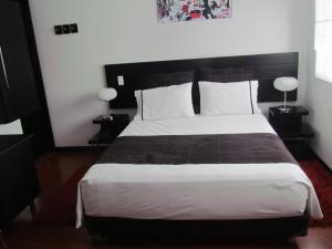 Ένα ή περισσότερα κρεβάτια σε δωμάτιο στο Hotel Classic