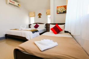Ein Bett oder Betten in einem Zimmer der Unterkunft Chean-Chean House