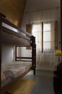 Postel nebo postele na pokoji v ubytování Splendida Vista, Sardegna