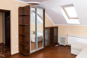 a room with a skylight in a loft at ANNAMARI in Pavshyno +84 photos