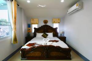 Ein Bett oder Betten in einem Zimmer der Unterkunft Chean-Chean House