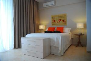 Ένα ή περισσότερα κρεβάτια σε δωμάτιο στο LESSIOTI APARTMENTS