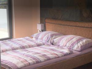 Posteľ alebo postele v izbe v ubytovaní das Haus in Jois
