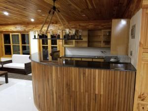 Kuchyň nebo kuchyňský kout v ubytování Chinar Resorts