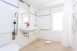 Ett badrum på Bed&BCN Baro