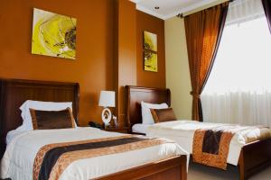 Кровать или кровати в номере Alejandrina Hotel