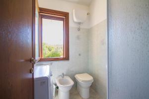 Ένα μπάνιο στο CASA VITALIA- SUPER Vista Mare-2 camere -Giardino-BBQ - WiFi FREE-Parcheggio IUNP5732