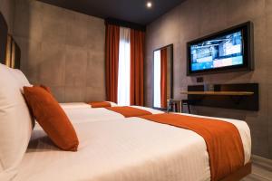Postelja oz. postelje v sobi nastanitve J24 Hotel Milano