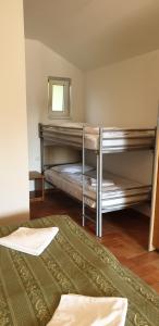 Posteľ alebo postele v izbe v ubytovaní Resort Beach Nová Živohošť