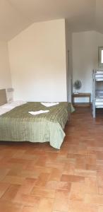 Posteľ alebo postele v izbe v ubytovaní Resort Beach Nová Živohošť