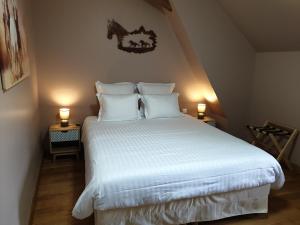 Кровать или кровати в номере Le Domaine de Bella