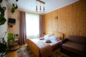 Postel nebo postele na pokoji v ubytování Synyogora