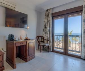 Kuchyň nebo kuchyňský kout v ubytování Hotel Playa de Regla