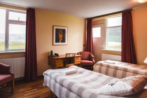 Postel nebo postele na pokoji v ubytování Hotel Latrabjarg