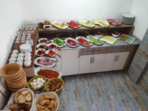 a buffet with many different types of food on it at Limon Pansiyon in Kaş