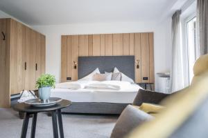 Postel nebo postele na pokoji v ubytování Hotel Walter