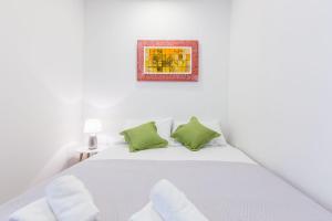 Łóżko lub łóżka w pokoju w obiekcie 2sis apartments