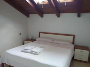 Uma cama ou camas num quarto em Apartments Garibaldi