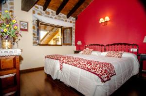 Cama o camas de una habitación en Apartamentos Rurales Larrago