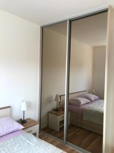 Posteľ alebo postele v izbe v ubytovaní Apartmani Matea