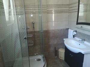 Koupelna v ubytování Apartments Ivanka