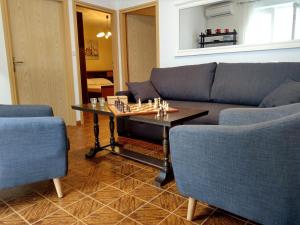 Ein Sitzbereich in der Unterkunft Holiday House Palma