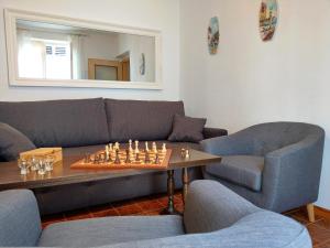 Ein Sitzbereich in der Unterkunft Holiday House Palma