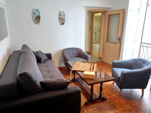 Ein Sitzbereich in der Unterkunft Holiday House Palma