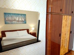 Ein Bett oder Betten in einem Zimmer der Unterkunft Holiday House Palma