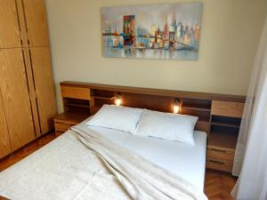 Ein Bett oder Betten in einem Zimmer der Unterkunft Holiday House Palma