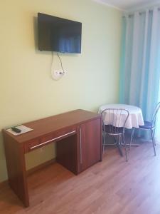 TV a/nebo společenská místnost v ubytování U Andzi