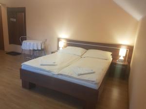 Postel nebo postele na pokoji v ubytování U Andzi