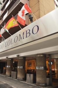 a building with a canadian flag on top of it at Hotel Cristoforo Colombo in Buenos Aires