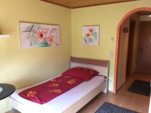Postel nebo postele na pokoji v ubytování Pension Seerose