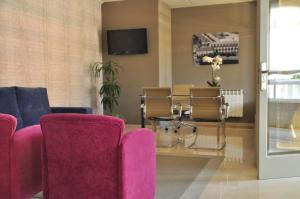 Telewizja i/lub zestaw kina domowego w obiekcie Hotel Casa Portuguesa