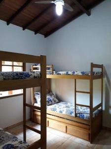 Giường tầng trong phòng chung tại Casa de campo