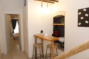 Kuchyň nebo kuchyňský kout v ubytování La Nicchia B&B + 35 fotografií