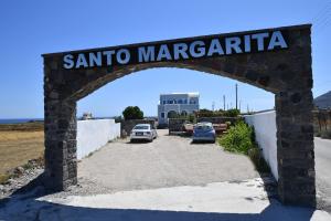 an entrance to santa margarita parking lot at Santo Margarita in Oia