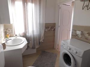 Ванна кімната в SOPHIA Appartament