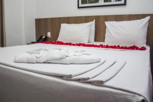 Cama ou camas em um quarto em Nobile Hotel Belo Horizonte