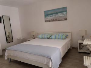 Katil atau katil-katil dalam bilik di Apartments Pina