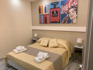Postel nebo postele na pokoji v ubytování B&B In Centro