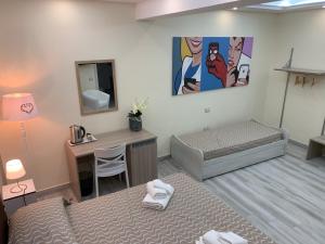 Postel nebo postele na pokoji v ubytování B&B In Centro