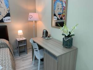 Postel nebo postele na pokoji v ubytování B&B In Centro